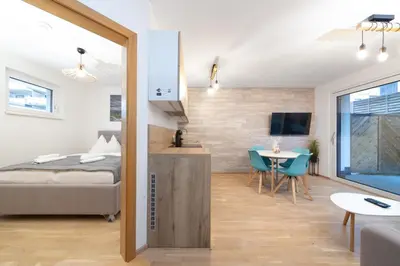 Ein Bett oder Betten in einem Zimmer der Unterkunft Apartment SCHLADMING - Neualm center
