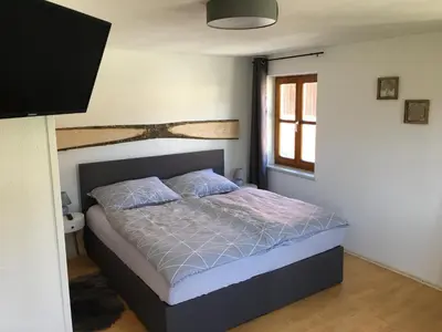 Ein Bett oder Betten in einem Zimmer der Unterkunft Ferienwohnung Radauer