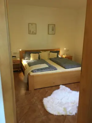 Ein Bett oder Betten in einem Zimmer der Unterkunft Sonnenweg Apartments