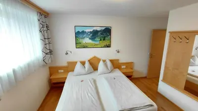 Ein Bett oder Betten in einem Zimmer der Unterkunft Haus Lienbacher