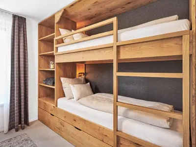 Ein Bett oder Betten in einem Zimmer der Unterkunft Galeriewohnung Hechelstein 105