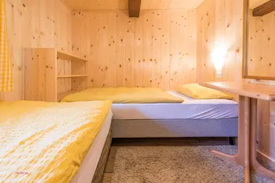 Ein Bett oder Betten in einem Zimmer der Unterkunft Almliesl ABTE-395