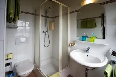 Ein Badezimmer in der Unterkunft KraftTanken direkt am See