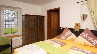 Ein Bett oder Betten in einem Zimmer der Unterkunft KraftTanken direkt am See