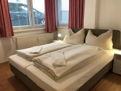 Ein Bett oder Betten in einem Zimmer der Unterkunft CityApartment MELITTA