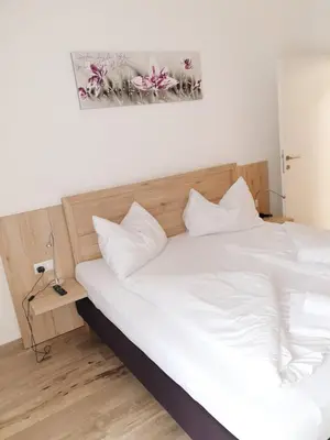 Ein Bett oder Betten in einem Zimmer der Unterkunft CityApartment MONIKA