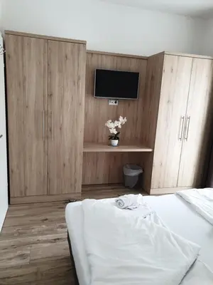 Ein Bett oder Betten in einem Zimmer der Unterkunft CityApartment MONIKA