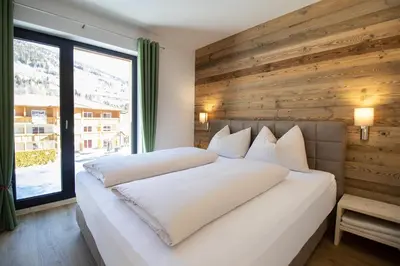 Ein Bett oder Betten in einem Zimmer der Unterkunft Kreischberg Suites by ALPS RESORTS