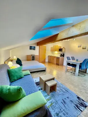 Ein Sitzbereich in der Unterkunft Apartment Ladinger