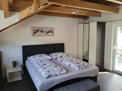 Ein Bett oder Betten in einem Zimmer der Unterkunft Apartment Katalin
