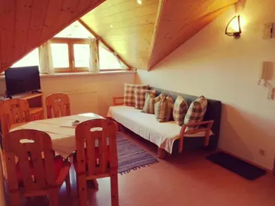 Ein Sitzbereich in der Unterkunft Haus Melody