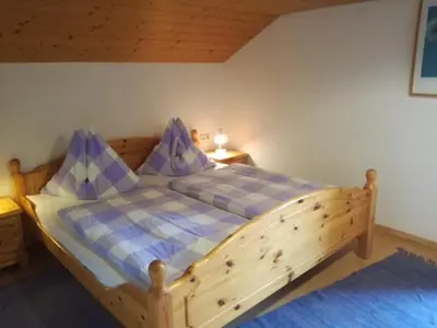 Ein Bett oder Betten in einem Zimmer der Unterkunft Haus Melody