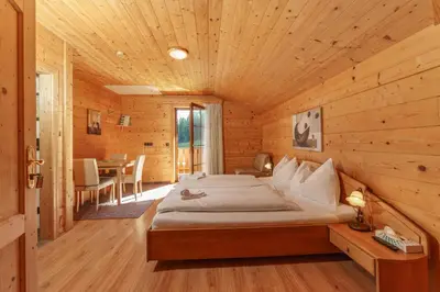 Ein Bett oder Betten in einem Zimmer der Unterkunft Ski In- Ski Out - Haus Stocker - direkt an der Skipiste by Schladmingurlaub