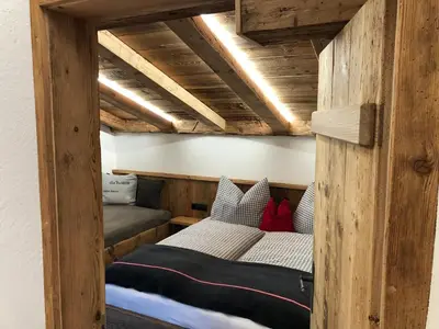 Ein Bett oder Betten in einem Zimmer der Unterkunft Haus Tannenheim