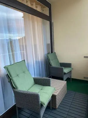 Ein Sitzbereich in der Unterkunft Cosy Apartment