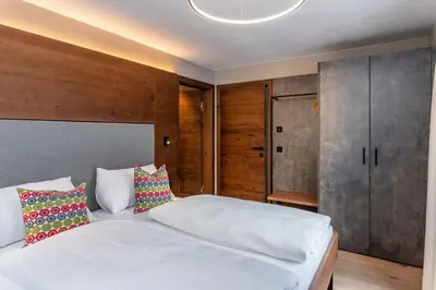 Ein Bett oder Betten in einem Zimmer der Unterkunft Appartements Wehrhof by Schladmingurlaub