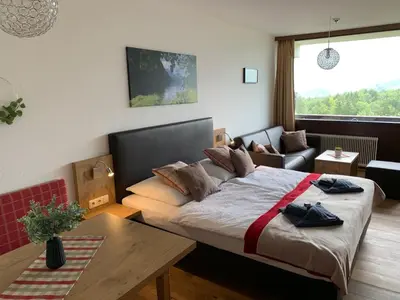 Ein Bett oder Betten in einem Zimmer der Unterkunft Goisererglück