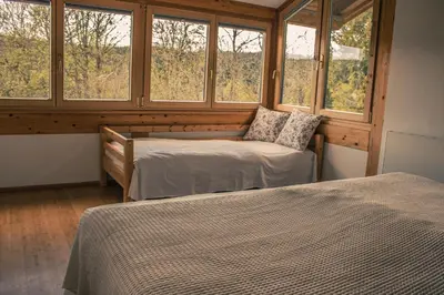 Ein Bett oder Betten in einem Zimmer der Unterkunft Ferienhaus Fanni