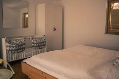 Ein Bett oder Betten in einem Zimmer der Unterkunft Ferienhaus Fanni