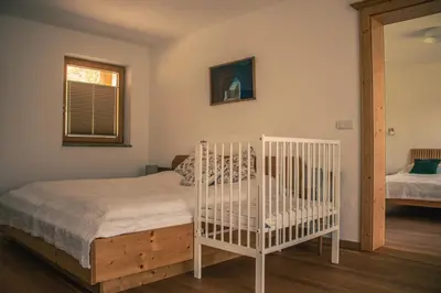 Ein Bett oder Betten in einem Zimmer der Unterkunft Ferienhaus Fanni