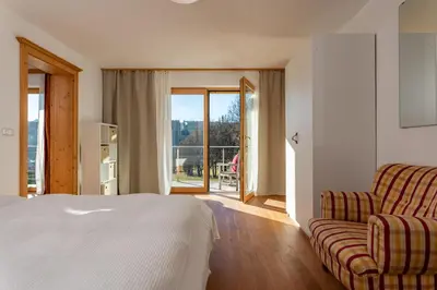 Ein Bett oder Betten in einem Zimmer der Unterkunft Ferienhaus Fanni