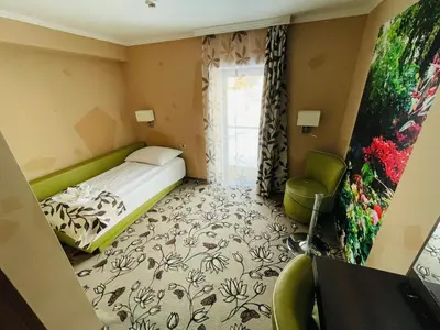 Ein Bett oder Betten in einem Zimmer der Unterkunft Hotel Pruggererhof