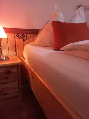 Ein Bett oder Betten in einem Zimmer der Unterkunft Appartements direkt am See