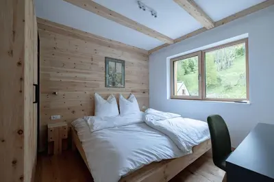 Ein Bett oder Betten in einem Zimmer der Unterkunft Franz Johann Aparts - 150m to slopes