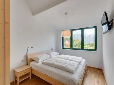 Ein Bett oder Betten in einem Zimmer der Unterkunft Wohnung in Hohentauern am Skilift
