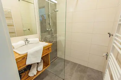 Ein Badezimmer in der Unterkunft Happy Aich 3 by Alpenidyll Apartments