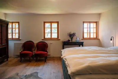 Ein Bett oder Betten in einem Zimmer der Unterkunft BAUERNHAUS DÖRFL IN DER STRASS