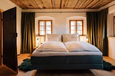 Ein Bett oder Betten in einem Zimmer der Unterkunft BAUERNHAUS DÖRFL IN DER STRASS
