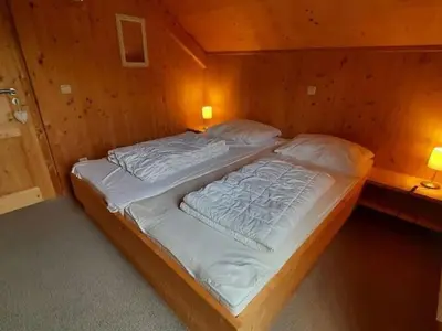 Ein Bett oder Betten in einem Zimmer der Unterkunft Chalet in Steiermark Kreischberg Ski