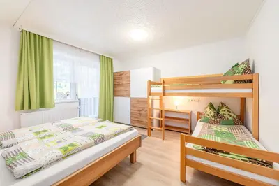 Ein Bett oder Betten in einem Zimmer der Unterkunft Barbara's Feriennest - by myNests