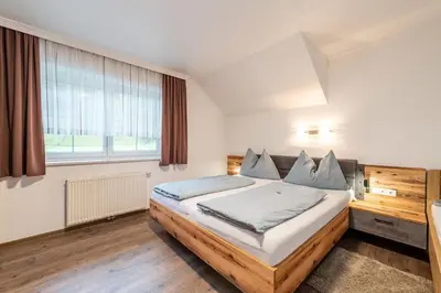 Ein Bett oder Betten in einem Zimmer der Unterkunft Barbara's Feriennest - by myNests