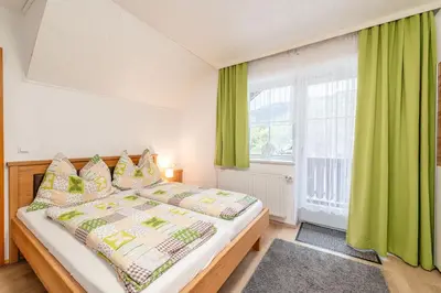 Ein Bett oder Betten in einem Zimmer der Unterkunft Barbara's Feriennest - by myNests