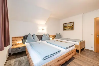 Ein Bett oder Betten in einem Zimmer der Unterkunft Barbara's Feriennest - by myNests