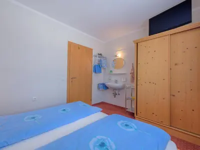 Ein Bett oder Betten in einem Zimmer der Unterkunft Haus Maier