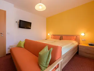 Ein Bett oder Betten in einem Zimmer der Unterkunft Haus Maier