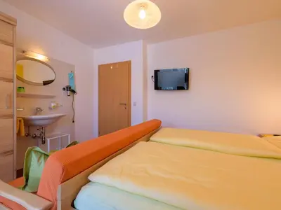 Ein Bett oder Betten in einem Zimmer der Unterkunft Haus Maier
