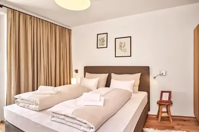 Ein Bett oder Betten in einem Zimmer der Unterkunft Adler Lodge D2 by AA Holiday Homes