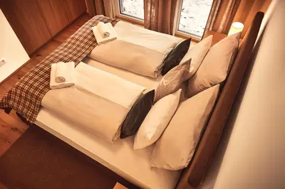 Ein Bett oder Betten in einem Zimmer der Unterkunft Adler Lodge D3 by AA Holiday Homes