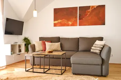Ein Sitzbereich in der Unterkunft die Tauplitz Lodges - Mountain view Lodge A11 by AA Holiday Homes