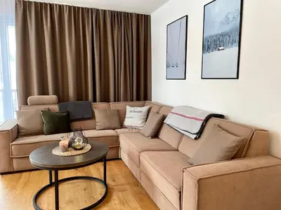 Ein Sitzbereich in der Unterkunft die Tauplitz Lodges - Alm Lodge A8 by AA Holiday Homes