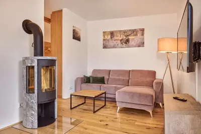 Ein Sitzbereich in der Unterkunft die Tauplitz Lodges - Bergblick Lodge B6 by AA Holiday Homes