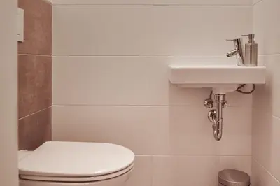 Ein Badezimmer in der Unterkunft die Tauplitz Lodges - Bergblick Lodge B6 by AA Holiday Homes