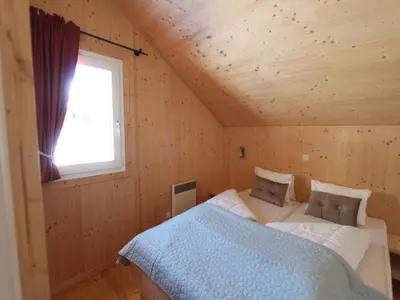 Ein Bett oder Betten in einem Zimmer der Unterkunft Chalet in Hohentauern am Skilift