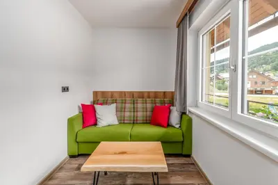 Ein Sitzbereich in der Unterkunft Landgasthof Bierfriedl