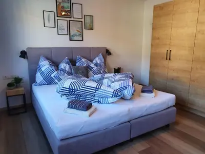 Ein Bett oder Betten in einem Zimmer der Unterkunft Beim Nannerl