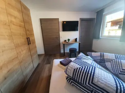 Ein Bett oder Betten in einem Zimmer der Unterkunft Beim Nannerl